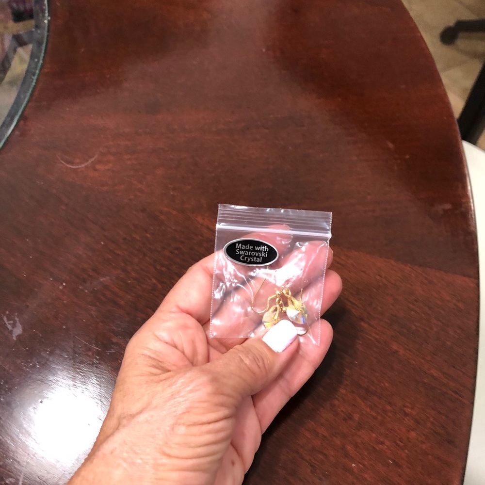 Swarovski women's earrings.  change their color wi